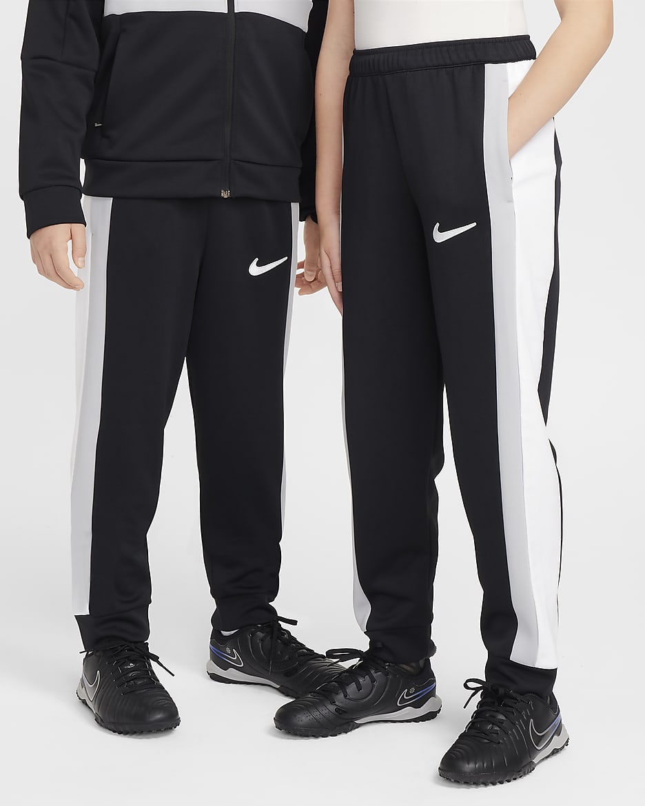 Nike stripe pants hotsell